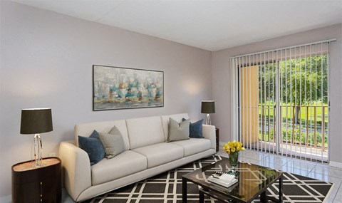 a living room with a couch and a table